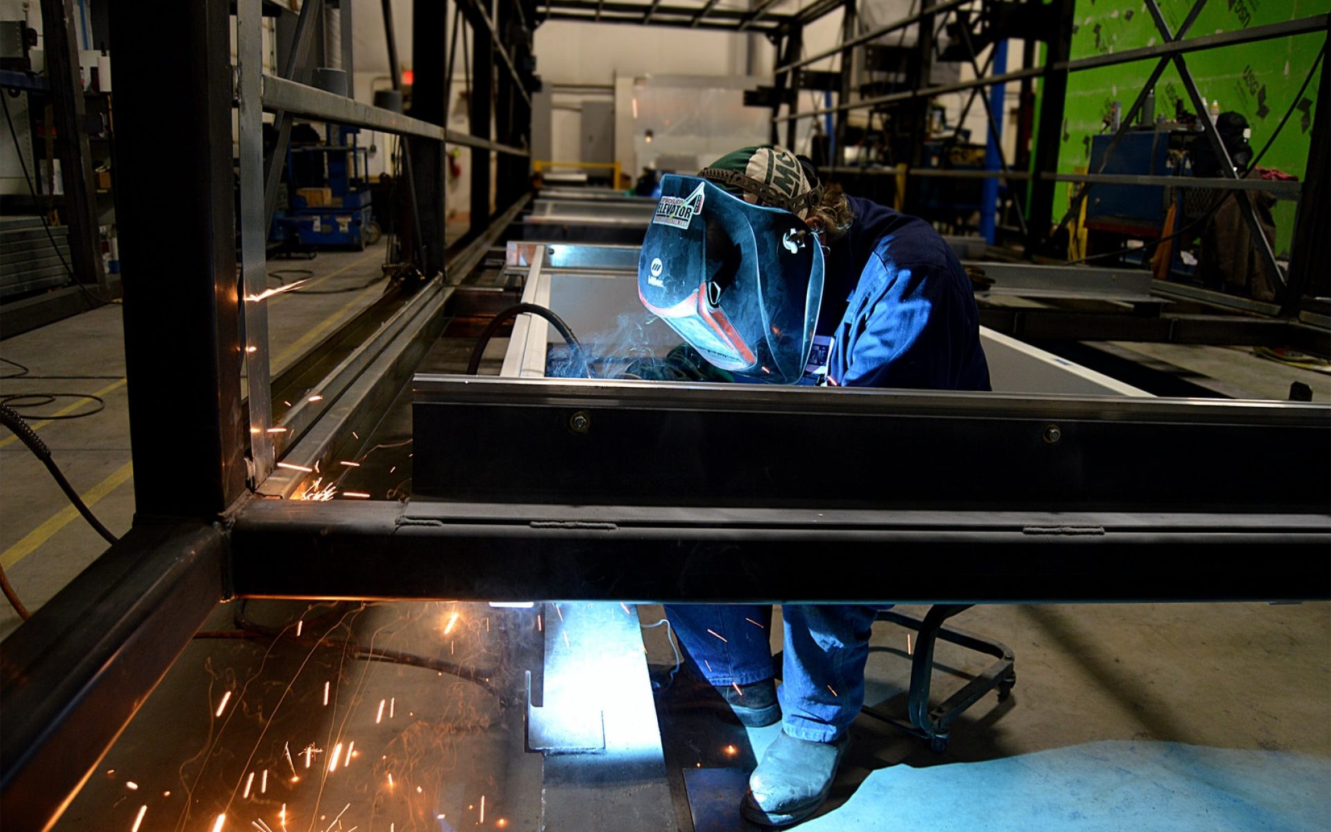 person welding metal
