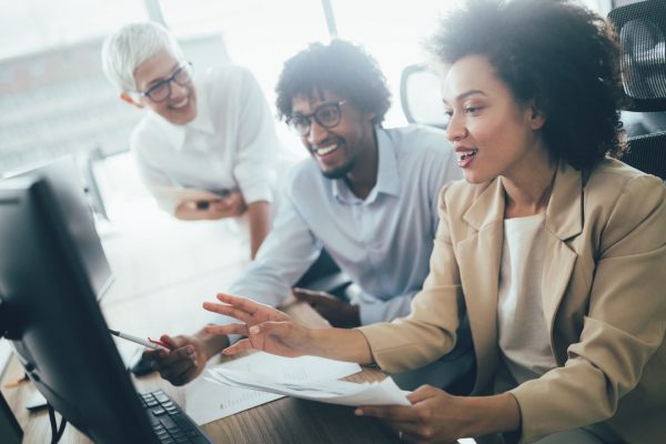 successful-business-group-of-people-at-work-in-off-YHBC2V7